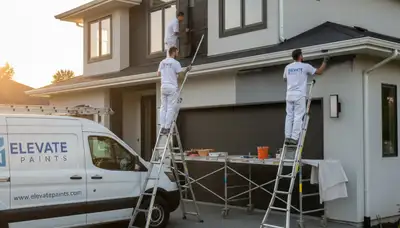Professional gutter painting service on a Hartford, CT home by local house painters