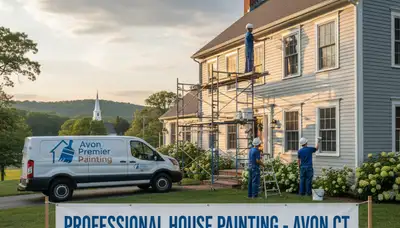 Professional house painters working on exterior home in Hartford, CT